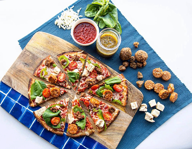 Pieology-Pizzeria-Launches-Plant-Based-Protein-Toppings-for-Healthier-Pizza.gif