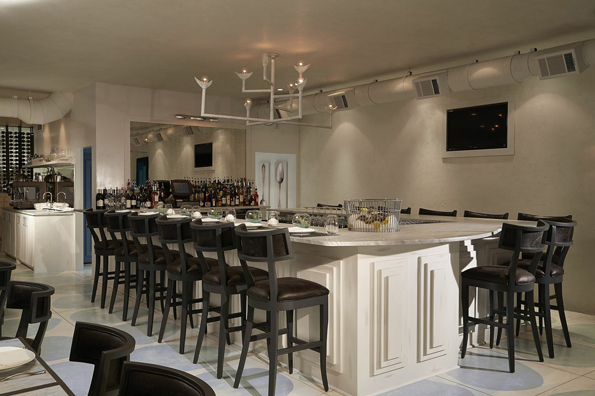 Spoon Bar & Kitchen is known for its semi-private wine room and experimental cuisine.