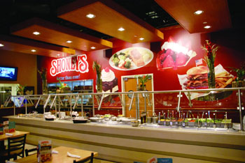 The salad bar and short buffet area in the Shoney’s unit