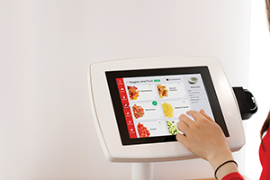 Customers make their orders via iPad and pay with a credit card.