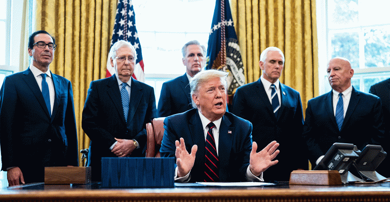 Donald-Trump-signs-CARES-Act.gif