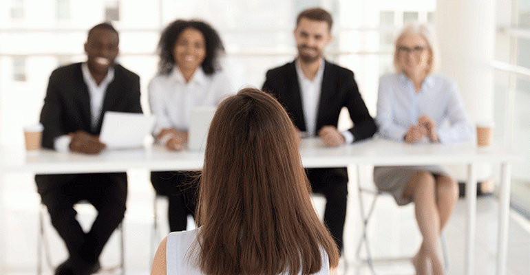 A potential executive hire interviewing with a panel