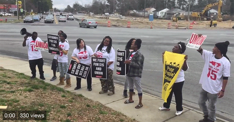 Fast-food workers march in Fight for $15 protests