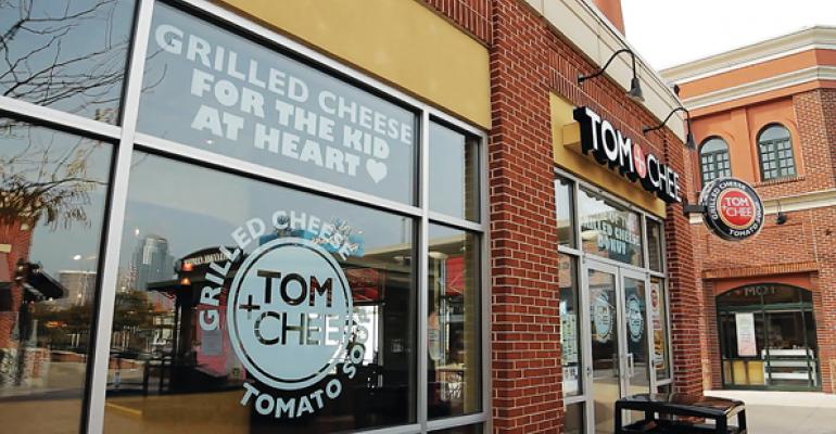 Grilled cheese specialist Tom  Chee offers 25 sandwich options plus custom grilled cheese soups salads and what the brand calls Fancy Grilled Cheese Donuts