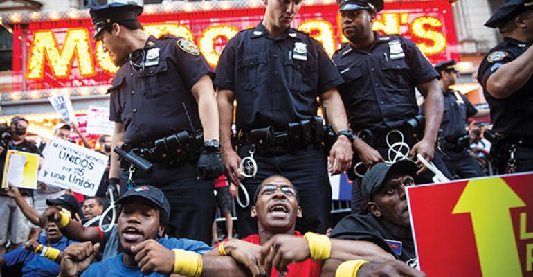 Protestors squared off with police at McDonald39s flagship on 42nd Street in New York
