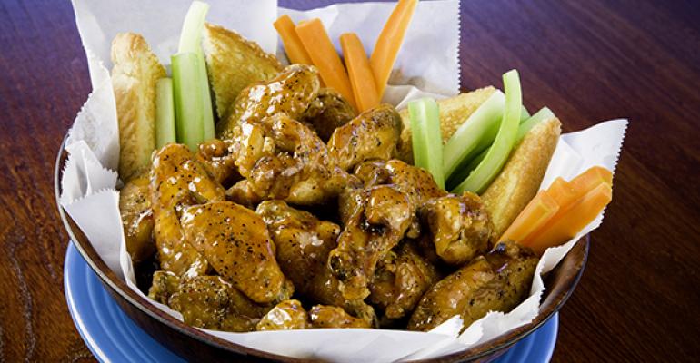 East Coast Wings amp Grill39s new Kamikaze wings are flavored with ginger molasses sesame crushed hot peppers vinegar garlic and salt