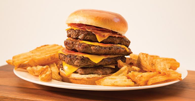 Wing Zone introduced the Widowmaker a hamburger with four quarterpound patties four slices of American cheese and four slices of bacon on a brioche bun