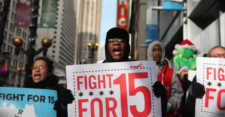 Demonstrators demanding an increase in pay for fastfood and retail workers protested in Chicago in December 2013