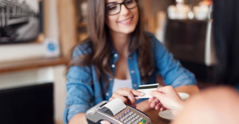 restaurant customer paying