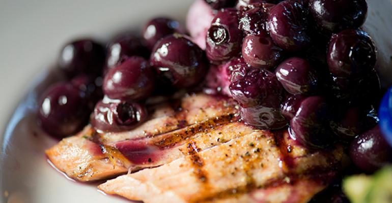 Sweet ripe blueberries meet savory salmon in the Oh So Blueberry Goat Cheese Alaska Salmon at Dukersquos Chowder House