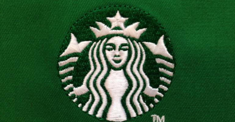 Starbucks its increasing salaries and stock benefits at its company stores and introducing a more lax dress code