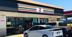 7-Eleven storefront-parking lot.jpg