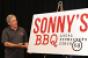 Sonnys CEO Bob Yarmuth unveils the companys new logo