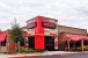 The redandwhite striped awnings are gone from new TGI Fridays prototype in Addison Texas