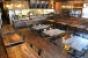 The dining room seating capacity remains the same featuring reclaimed woods and new branding