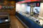 Freebirds order and assembly line features the introduction of digital menu boards and a passthrough walkin cooler for quick access by team members