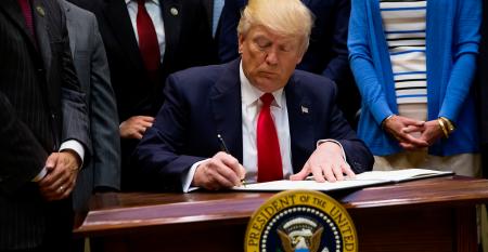 Donald Trump signing an executive order